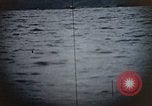 Standbild US Submarine Torpedos japanischen Frachter Japan, 1945, aus Sekunde 25 historischem Filmmaterial Videoclip 65675052644