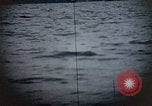 Standbild US Submarine Torpedos japanischen Frachter Japan, 1945, aus Sekunde 26 historischem Filmmaterial Videoclip 65675052644