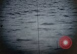 Standbild US Submarine Torpedos japanischen Frachter Japan, 1945, aus Sekunde 27 historischem Filmmaterial Videoclip 65675052644