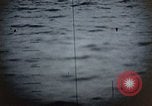 Standbild US Submarine Torpedos japanischen Frachter Japan, 1945, aus Sekunde 28 historischem Filmmaterial Videoclip 65675052644