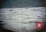 Standbild US Submarine Torpedos japanischen Frachter Japan, 1945, aus Sekunde 34 historischem Filmmaterial Videoclip 65675052644