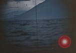 Standbild US Submarine Torpedos japanischen Frachter Japan, 1945, aus Sekunde 38 historischem Filmmaterial Videoclip 65675052644