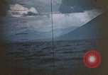 Standbild US Submarine Torpedos japanischen Frachter Japan, 1945, aus Sekunde 42 historischem Filmmaterial Videoclip 65675052644