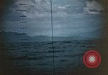 Standbild US Submarine Torpedos japanischen Frachter Japan, 1945, aus Sekunde 46 historischem Filmmaterial Videoclip 65675052644