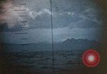 Standbild US Submarine Torpedos japanischen Frachter Japan, 1945, aus Sekunde 48 historischem Filmmaterial Videoclip 65675052644