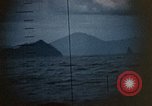 Standbild US Submarine Torpedos japanischen Frachter Japan, 1945, aus Sekunde 57 historischem Filmmaterial Videoclip 65675052644