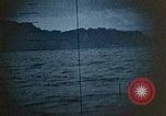 Standbild US Submarine Torpedos japanischen Frachter Japan, 1945, aus Sekunde 59 historischem Filmmaterial Videoclip 65675052644
