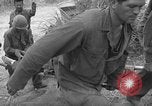 Image of 7th Infantry Division soldiers Okinawa Ryukyu Islands, 1945, second 35 stock footage video 65675052681