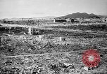 Standbild Japanische Team Umfragen Hiroshima Atombombe Schäden Hiroshima Japan, 1945, aus Sekunde 17 historischem Filmmaterial Videoclip 65675052703