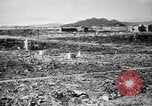 Standbild Japanische Team Umfragen Hiroshima Atombombe Schäden Hiroshima Japan, 1945, aus Sekunde 18 historischem Filmmaterial Videoclip 65675052703