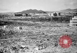 Standbild Japanische Team Umfragen Hiroshima Atombombe Schäden Hiroshima Japan, 1945, aus Sekunde 20 historischem Filmmaterial Videoclip 65675052703