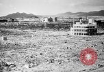 Standbild Japanische Team Umfragen Hiroshima Atombombe Schäden Hiroshima Japan, 1945, aus Sekunde 22 historischem Filmmaterial Videoclip 65675052703