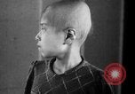 Standbild japanischen Patienten Hiroshima Japan, 1945, aus Sekunde 22 historischem Filmmaterial Videoclip 65675052708