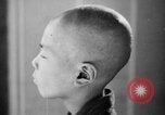 Standbild japanischen Patienten Hiroshima Japan, 1945, aus Sekunde 27 historischem Filmmaterial Videoclip 65675052708