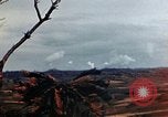 Standbild weißer Phosphor Explosionen Yasusu Dorf Okinawa Ryukyu Inseln, 1945, aus Sekunde 12 historischem Filmmaterial Videoclip 65675052734