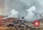 Standbild weißer Phosphor Explosionen Yasusu Dorf Okinawa Ryukyu Inseln, 1945, aus Sekunde 17 historischem Filmmaterial Videoclip 65675052734