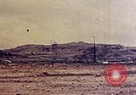 Standbild beschädigt Hangars Okinawa Ryukyu Inseln, 1945, aus Sekunde 8 historischem Filmmaterial Videoclip 65675052800