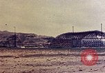 Standbild beschädigt Hangars Okinawa Ryukyu Inseln, 1945, aus Sekunde 19 historischem Filmmaterial Videoclip 65675052800