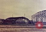 Standbild beschädigt Hangars Okinawa Ryukyu Inseln, 1945, aus Sekunde 24 historischem Filmmaterial Videoclip 65675052800