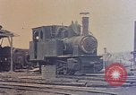 Image of demolished Japanese locomotive Naha Okinawa Ryukyu Islands, 1945, second 15 stock footage video 65675052874