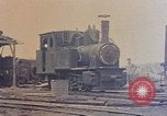 Image of demolished Japanese locomotive Naha Okinawa Ryukyu Islands, 1945, second 16 stock footage video 65675052874