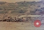 Image of wrecked Japanese planes Naha Okinawa Ryukyu Islands, 1945, second 26 stock footage video 65675052875