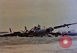 Image of wrecked Japanese planes Naha Okinawa Ryukyu Islands, 1945, second 56 stock footage video 65675052875
