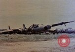 Image of wrecked Japanese planes Naha Okinawa Ryukyu Islands, 1945, second 58 stock footage video 65675052875