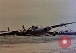 Image of wrecked Japanese planes Naha Okinawa Ryukyu Islands, 1945, second 59 stock footage video 65675052875