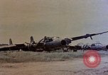 Image of wrecked Japanese planes Naha Okinawa Ryukyu Islands, 1945, second 61 stock footage video 65675052875