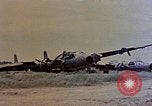 Image of wrecked Japanese planes Naha Okinawa Ryukyu Islands, 1945, second 62 stock footage video 65675052875