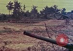 Image of artillery emplacement of 8th 155mm Gun Battalion Naha Okinawa Ryukyu Islands, 1945, second 60 stock footage video 65675052914