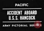 Image of USS Hancock on fire Pacific Ocean, 1945, second 1 stock footage video 65675052932