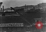 Image of US soldiers protect commodities sea port Vladivostok Russia, 1918, second 16 stock footage video 65675053025