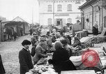 Image of US soldiers visit an open air market Archangel Russia, 1918, second 6 stock footage video 65675053036