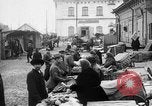 Image of US soldiers visit an open air market Archangel Russia, 1918, second 7 stock footage video 65675053036