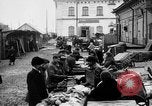 Image of US soldiers visit an open air market Archangel Russia, 1918, second 15 stock footage video 65675053036