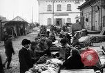 Image of US soldiers visit an open air market Archangel Russia, 1918, second 16 stock footage video 65675053036