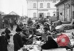 Image of US soldiers visit an open air market Archangel Russia, 1918, second 21 stock footage video 65675053036