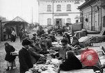 Image of US soldiers visit an open air market Archangel Russia, 1918, second 23 stock footage video 65675053036