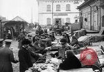 Image of US soldiers visit an open air market Archangel Russia, 1918, second 24 stock footage video 65675053036