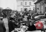 Image of US soldiers visit an open air market Archangel Russia, 1918, second 25 stock footage video 65675053036
