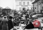 Image of US soldiers visit an open air market Archangel Russia, 1918, second 26 stock footage video 65675053036
