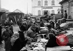 Image of US soldiers visit an open air market Archangel Russia, 1918, second 32 stock footage video 65675053036