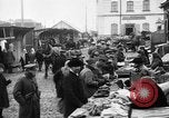 Image of US soldiers visit an open air market Archangel Russia, 1918, second 34 stock footage video 65675053036