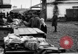 Image of US soldiers visit an open air market Archangel Russia, 1918, second 38 stock footage video 65675053036