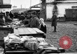 Image of US soldiers visit an open air market Archangel Russia, 1918, second 39 stock footage video 65675053036