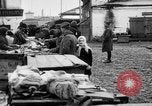 Image of US soldiers visit an open air market Archangel Russia, 1918, second 40 stock footage video 65675053036