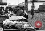 Image of US soldiers visit an open air market Archangel Russia, 1918, second 41 stock footage video 65675053036