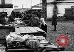 Image of US soldiers visit an open air market Archangel Russia, 1918, second 42 stock footage video 65675053036